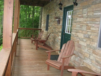 Lower level covered porch Arbor Den Log Cabin Rental Boone Blowing Rock NC 
