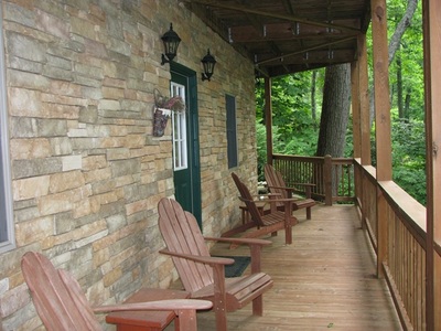 Lower level covered porch Arbor Den Log Cabin Rental Boone Blowing Rock NC 
