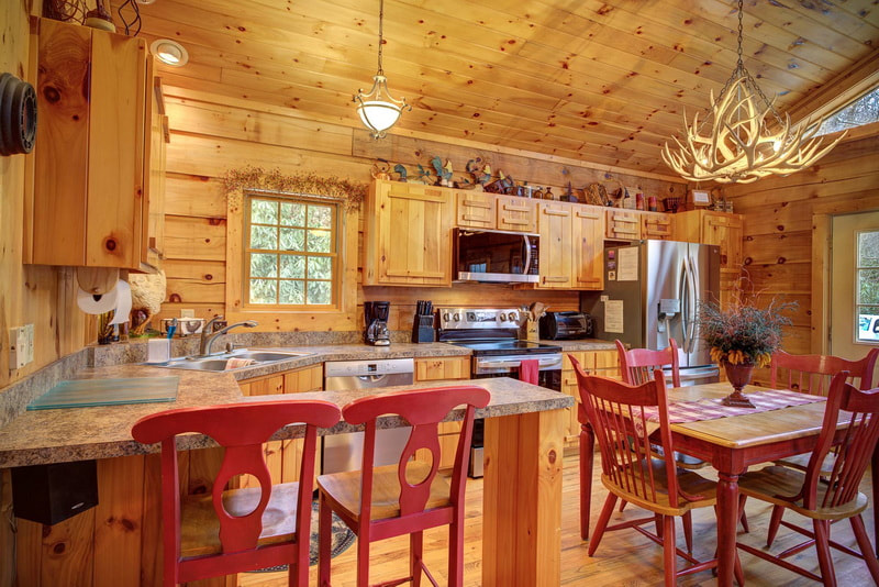 Picture kitchen of log cabin rental in boone nc